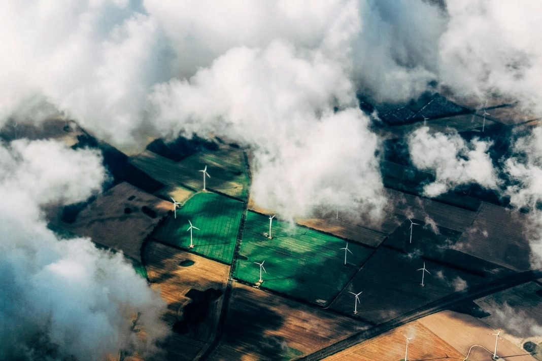 Photo by Thomas Richter aerial photo of wind turbines near field