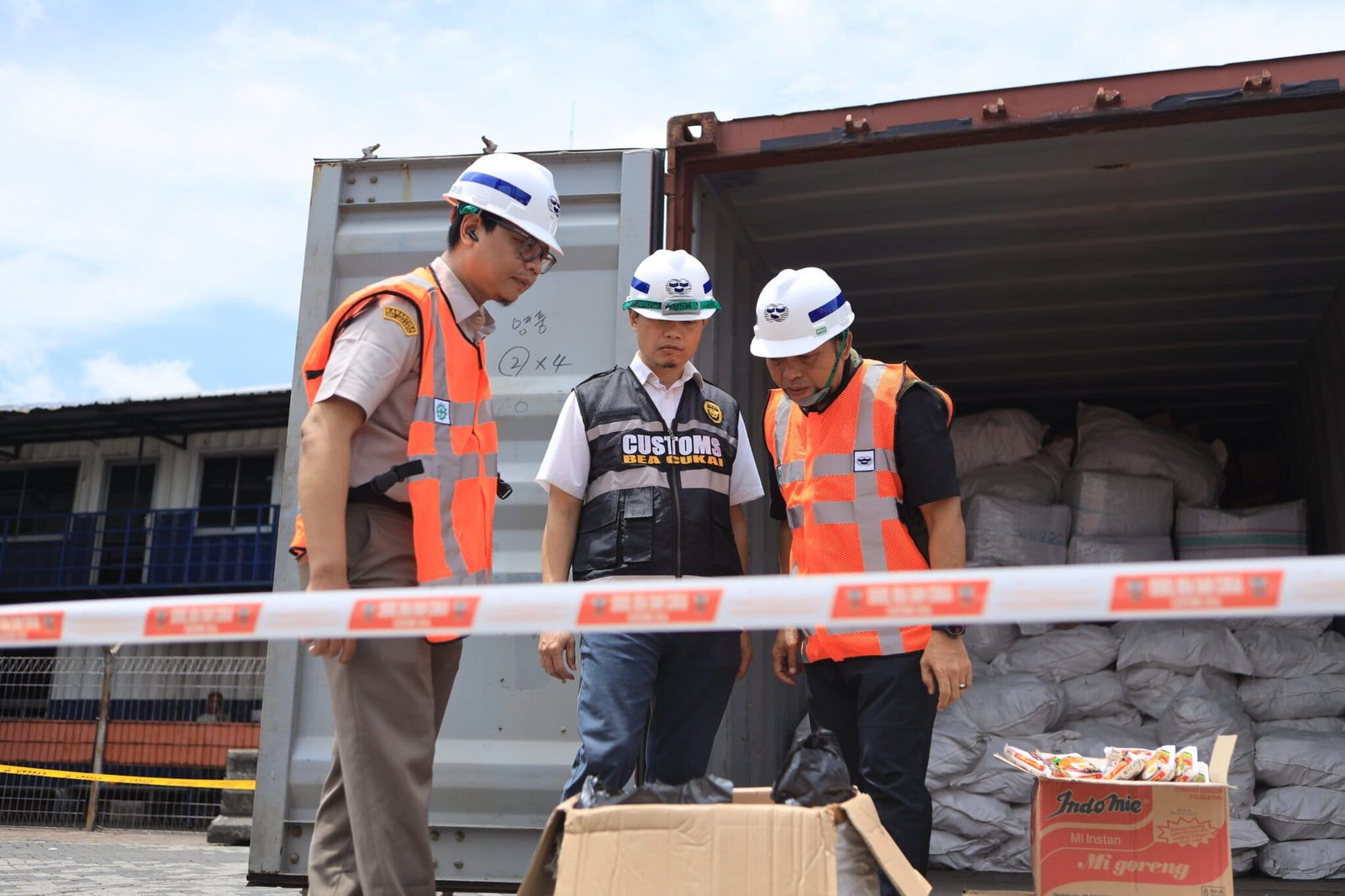 Tanjung Priok customs officers inspect pangolin scales intended for smuggling into Cambodia. 