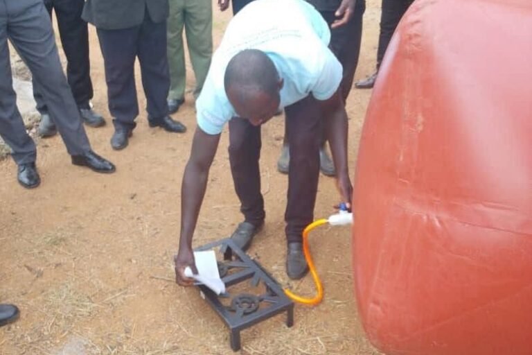 Community members test the biogas system in Nkhundye village. Image courtesy of Biogas Technology in Zambia.