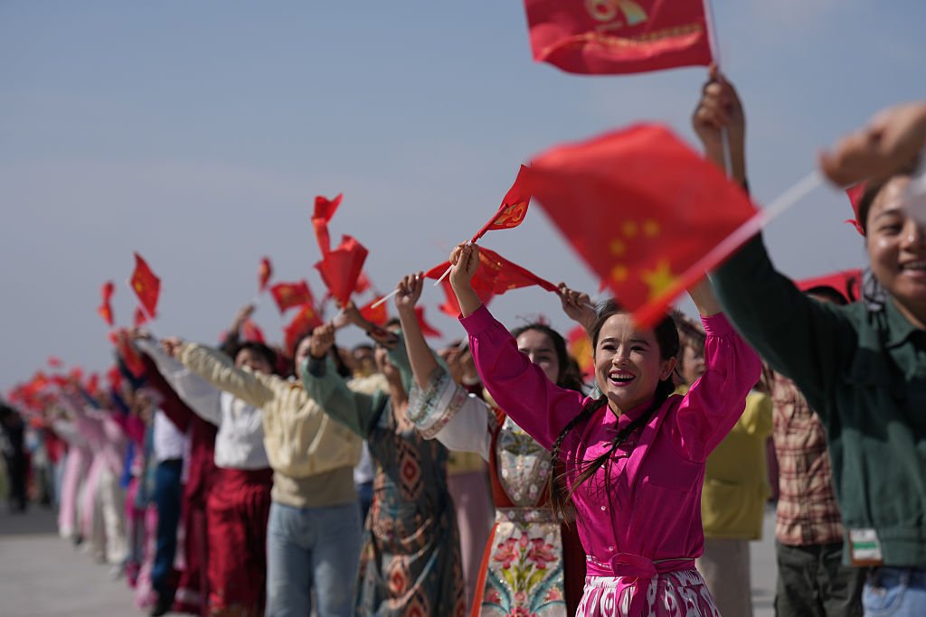 Xi Arrives In Urumqi For Celebrations Of 70th Founding Anniversary Of Xinjiang Uygur Autonomous Region