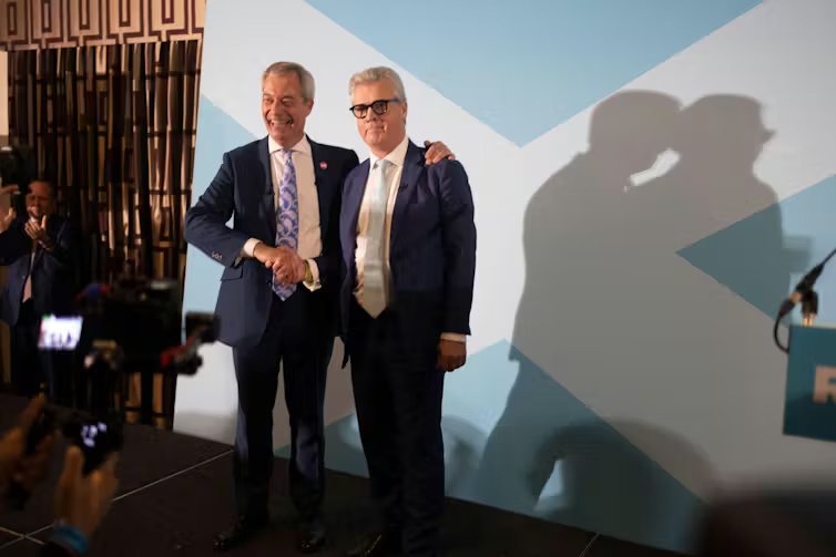 Malcolm Offord and Nigel Farage pose for photo op