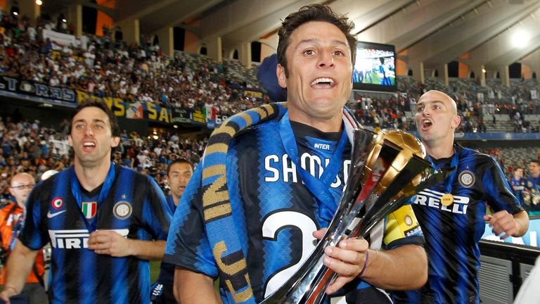 Javier Zanetti celebrates with the Club World Cup trophy