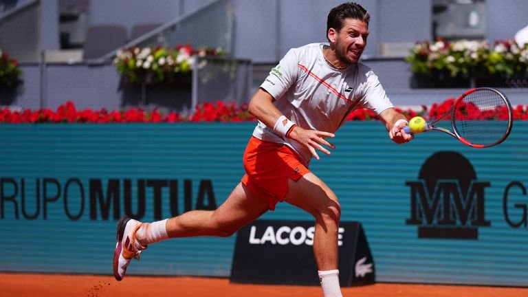 Sinner brushes Norrie aside at Madrid Open 1 Cameron Norrie of Britain returns the ball to Jannik Sinner of Italy during their round of 16 match at the Madrid Open tennis tournament in Madrid, Tuesday, April 28, 2026. (AP Photo/Manu Fernandez)