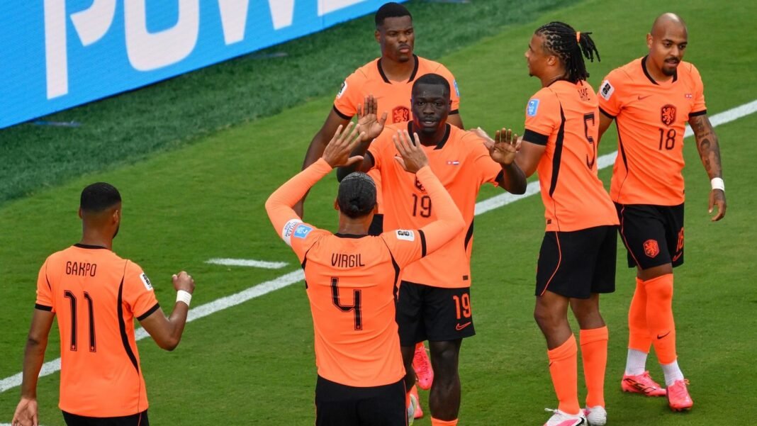 Netherlands' Brian Brobbey (19) celebrates their second goal with Virgil van Dijk (4) and teammates during the World Cup Group F soccer match between Tunisia and the Netherlands in Kansas City, Mo., Thursday, June 25, 2026. (AP Photo/Reed Hoffmann)
