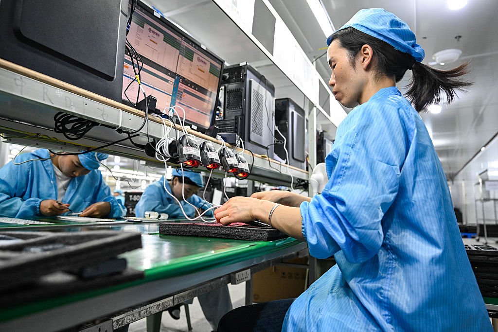 Workers Assemble Mobile Phones For Export In Zunyi