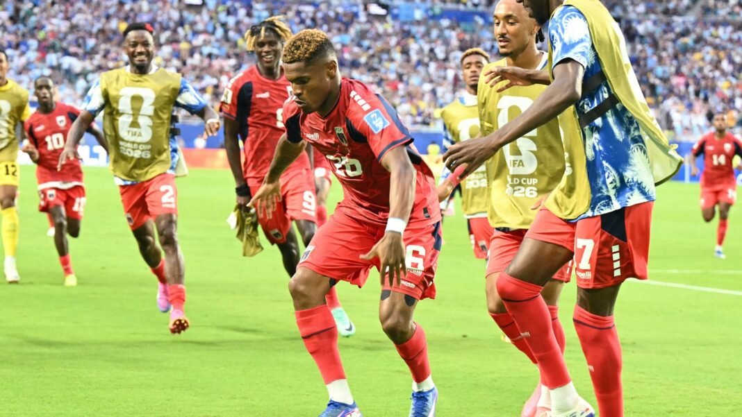 Helio Varela (C) celebrates with teammates after scoring his team's second goal 