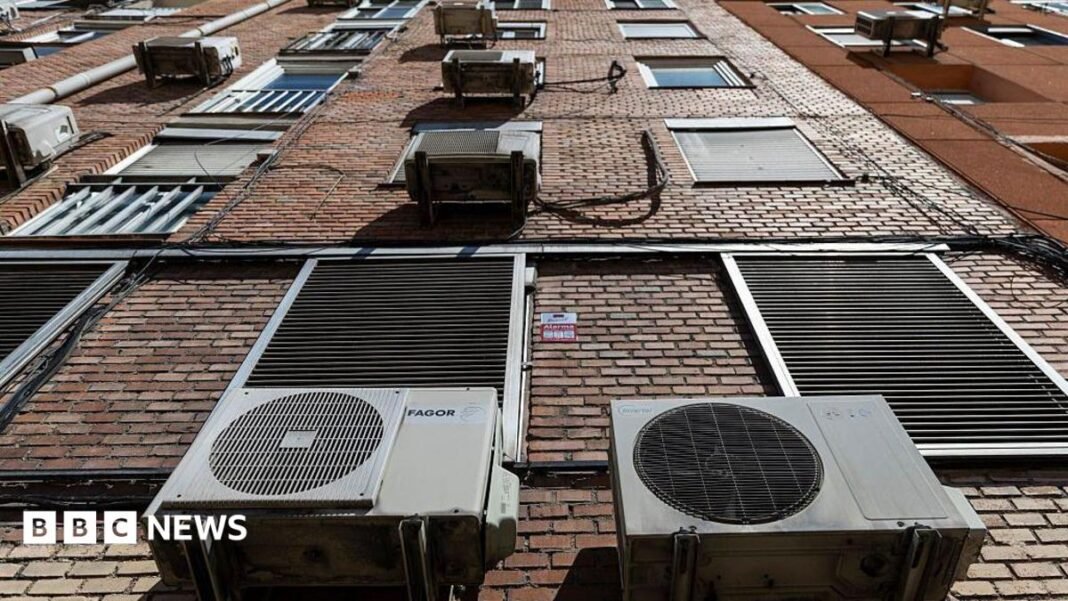 As heatwaves strike, Europeans turn to Chinese air-conditioners Outdoor air conditioning units are pictured on a building