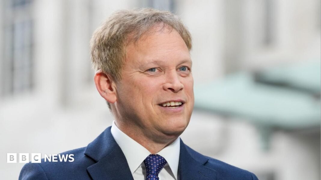 Grant Shapps in a suit and tie