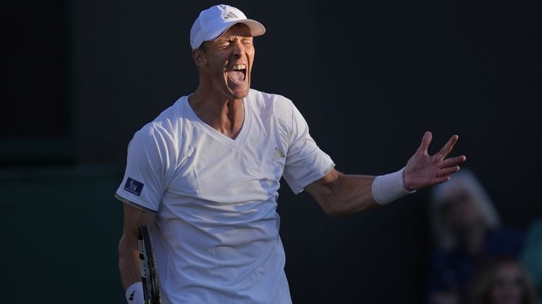 Jan Choinski of Great Britain reacts after being broken in the third set during his Gentlemen's Singles match against Frances Tiafoe of the 
