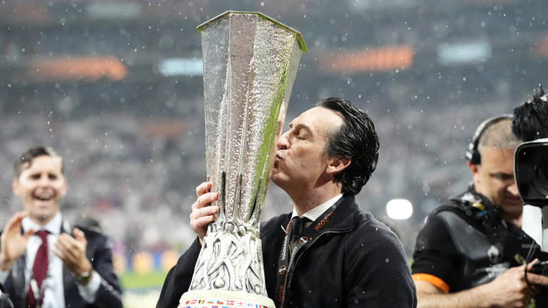 Unai Emery kisses the Europa League trophy after Aston Villa's win