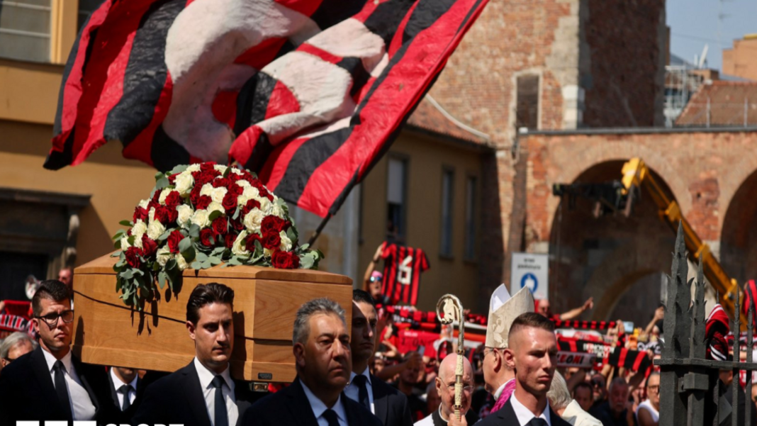 Pallbearers carry the coffin outside the Basilica of Sant'Ambrogio during the funeral of former AC Milan and Italy soccer player Franco Baresi