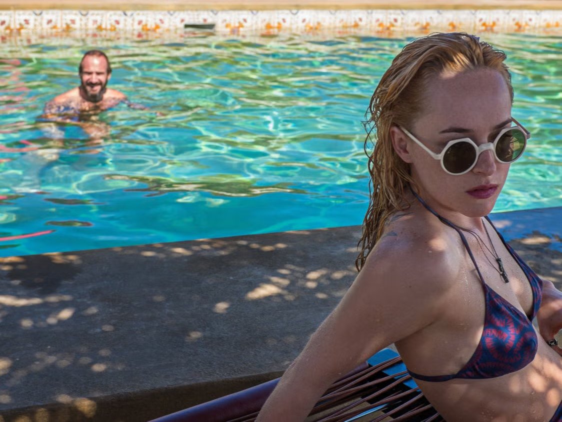 Our holidays have become smartphone binges – here’s how we can truly relax 2 Switching off: Ralph Fiennes and Dakota Johnson in Guadagnino’s acclaimed 2015 film ‘A Bigger Splash’